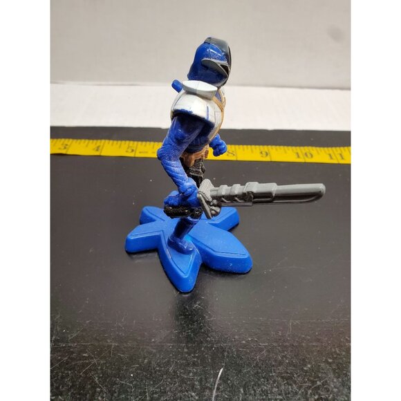 Blue Action Figure On Star-Shaped Base With Sword - Picture 5 of 9